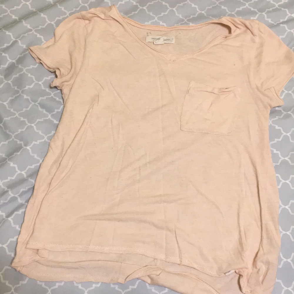 I am calling a salmon color T-shirt.